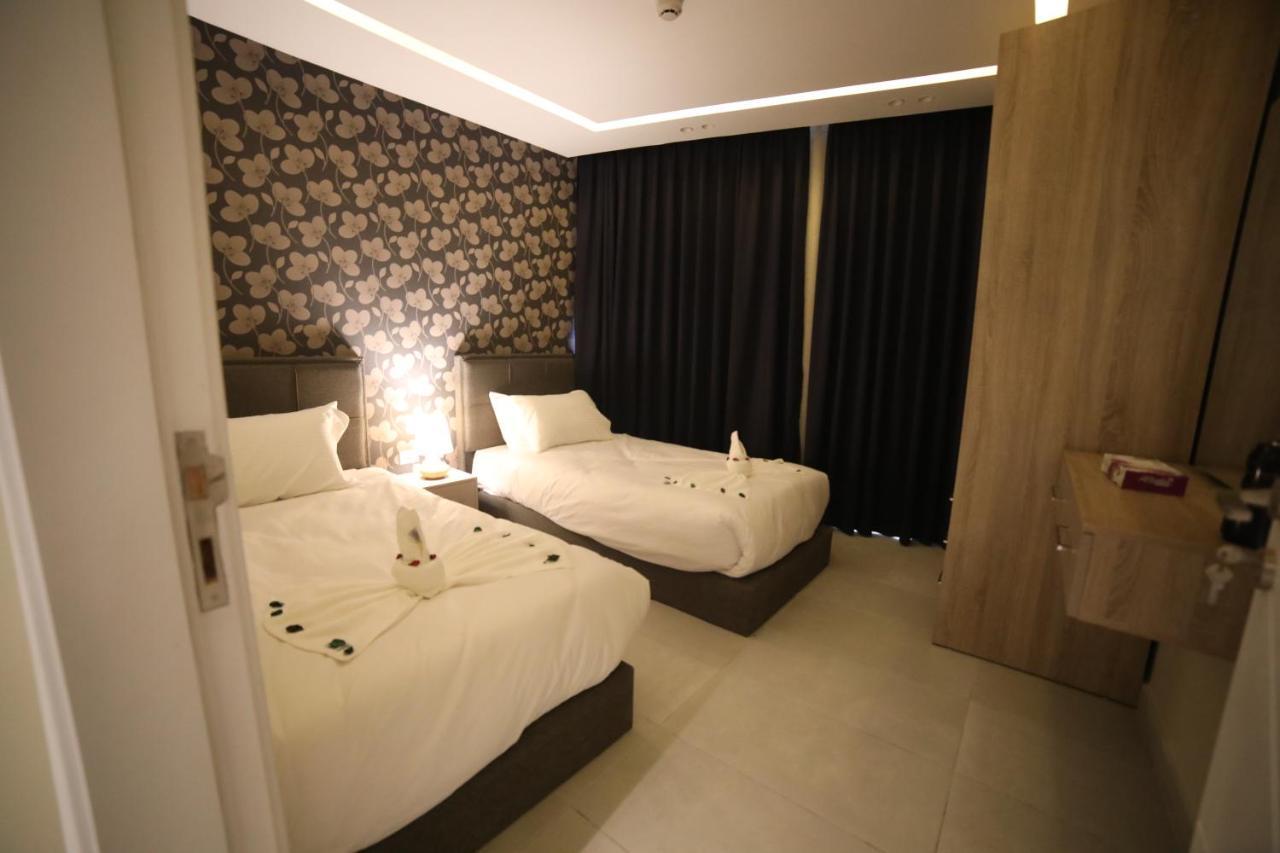 فندق صحارى الخليج Sahara Gulf Hotel Apartments Амман Экстерьер фото